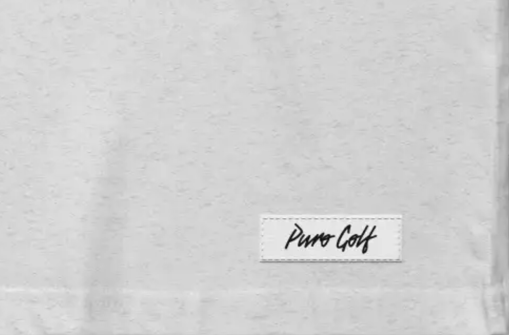 Label with 'Puma Golf' on left hem